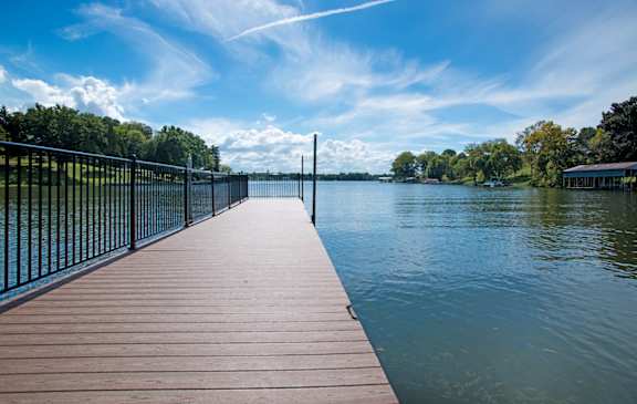 Lake dock with fence at Ventana at The Lake, Hendersonville, TN 37075.